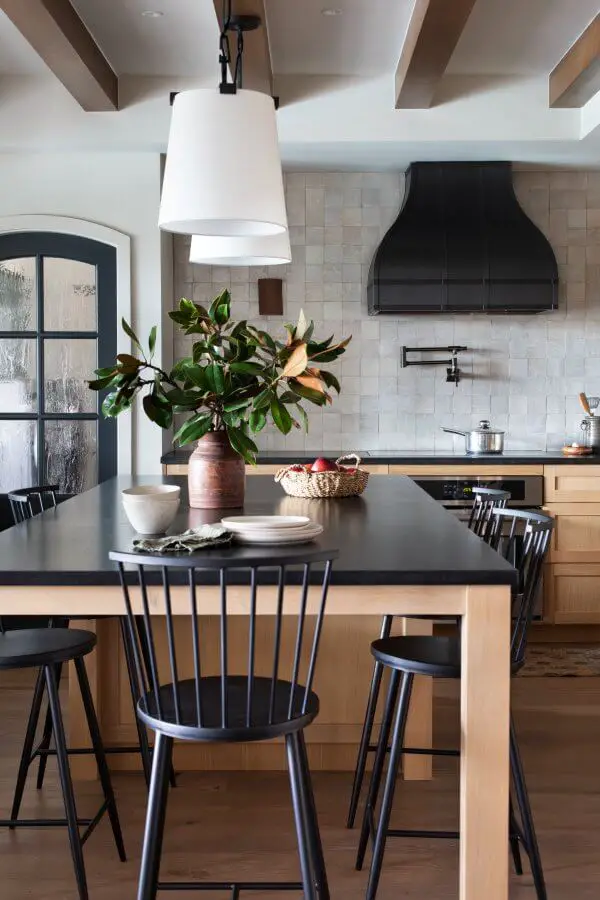 Black granite countertops and wood cabinets