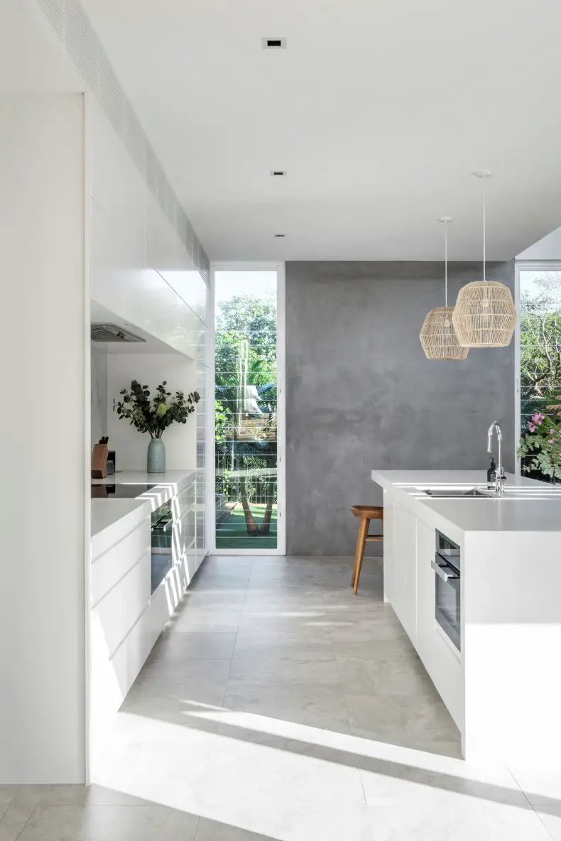 gray accent wall white kitchen
